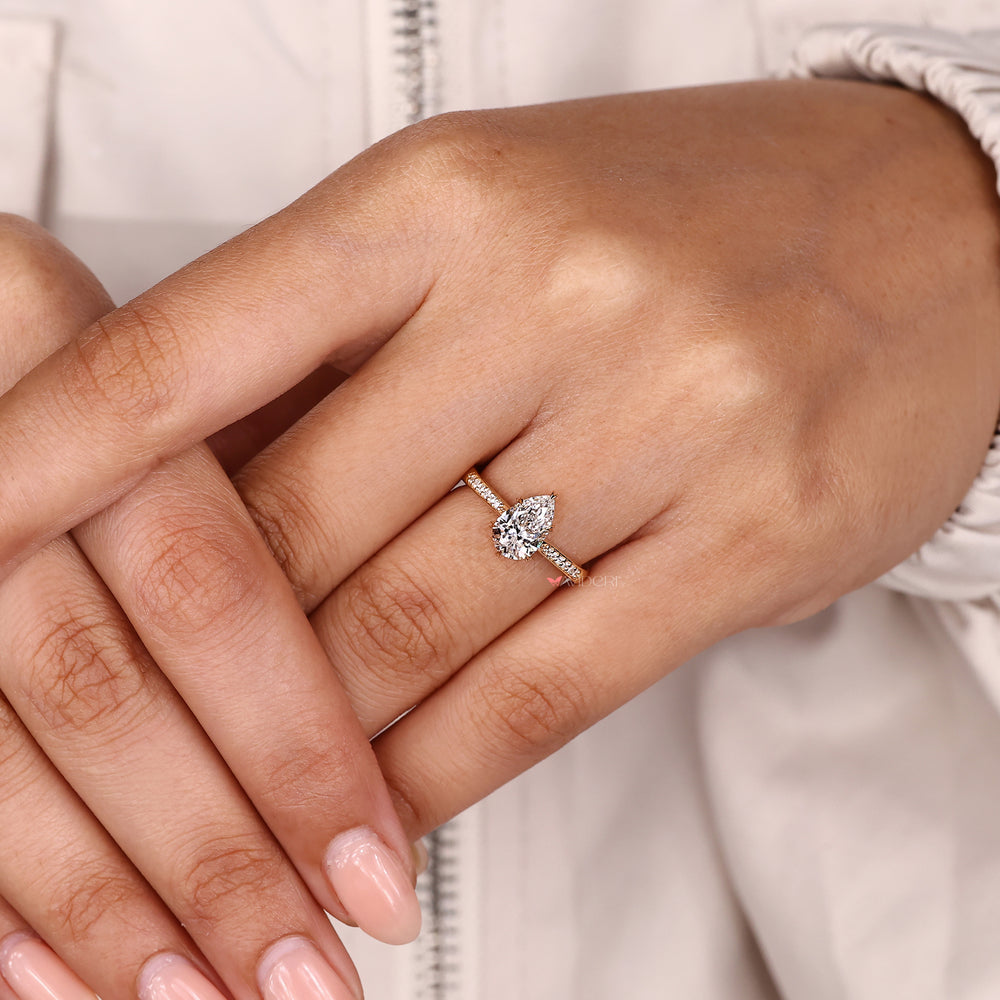 Avideri pear cut diamond ring with pave band.
