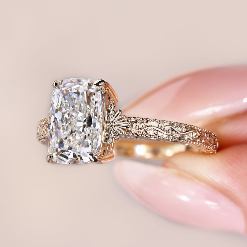 Lab grown cushion diamond ring with milgrain detail.
