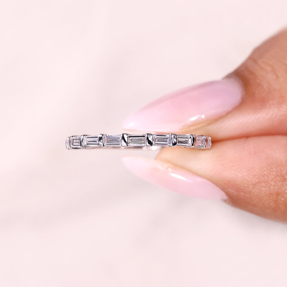 Half eternity band with bar set diamonds.
