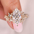 Marquise diamond ring with pave style band.
