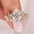 Marquise diamond ring with pave style band.

