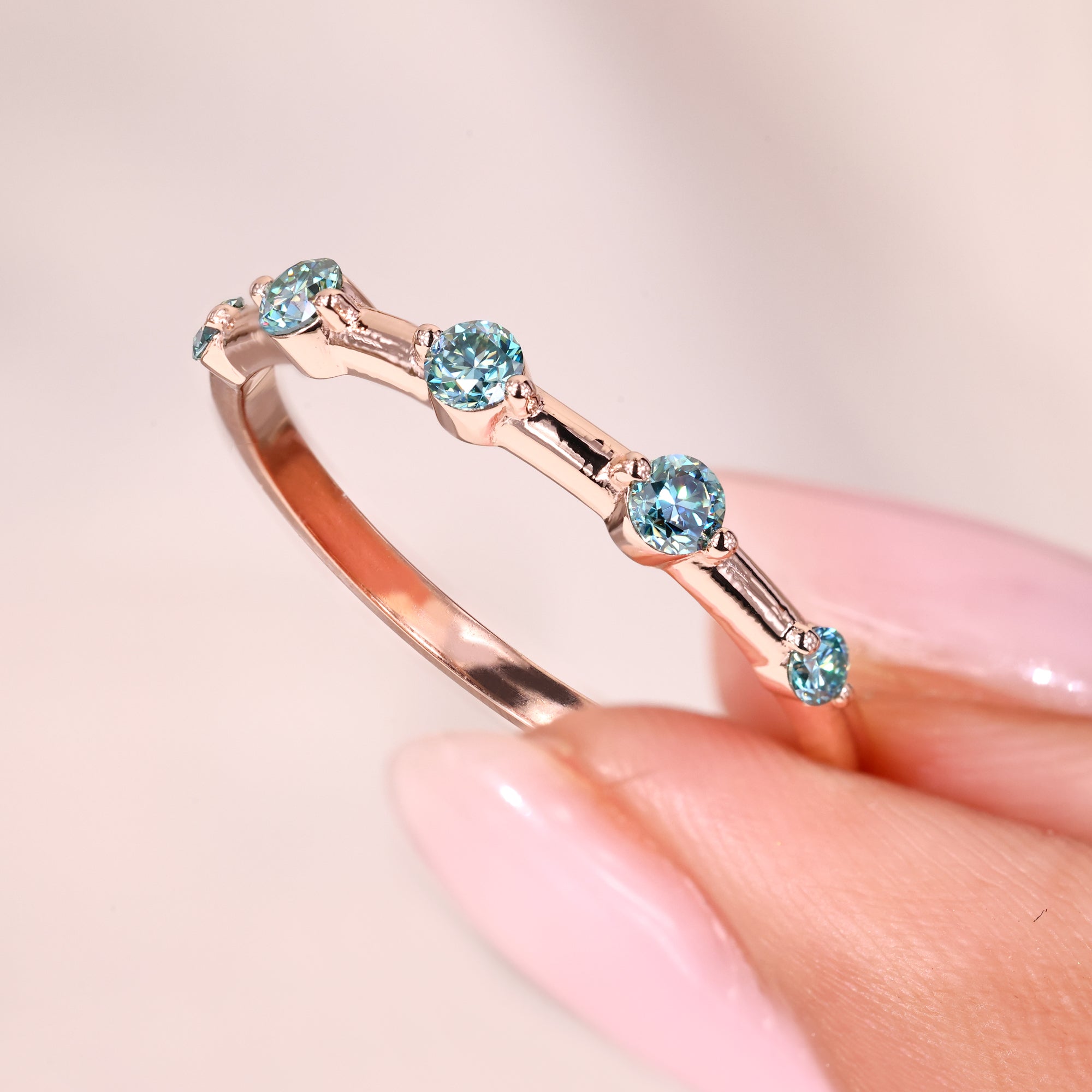 Round moissanite band offers brilliant sparkle in a timeless, elegant design.