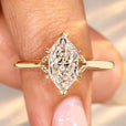 Classic solitaire Dutch marquise engagement ring.
