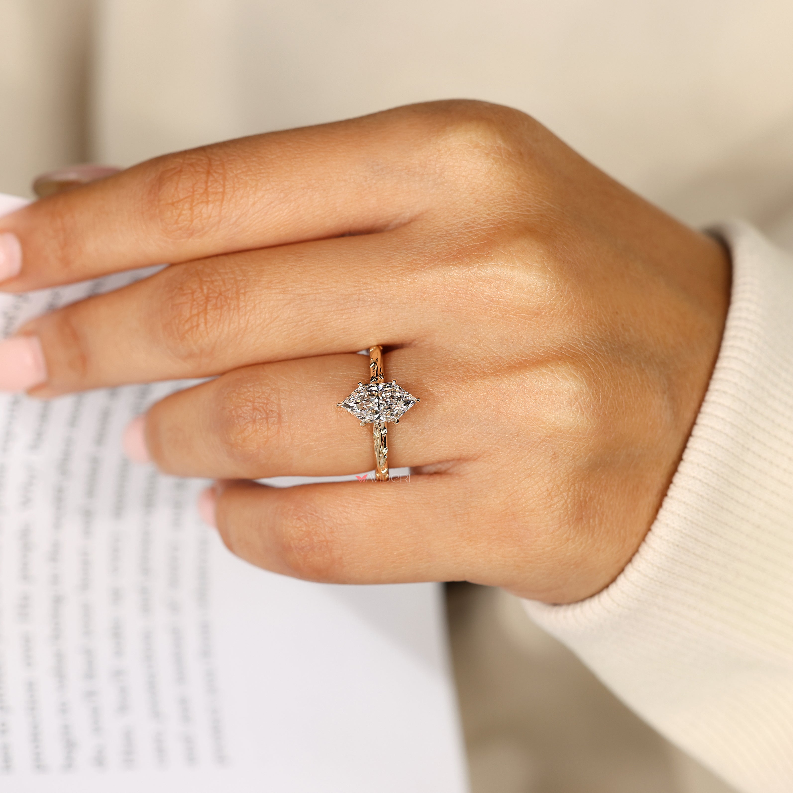 Dutch marquise ring with butterfly style detail.
