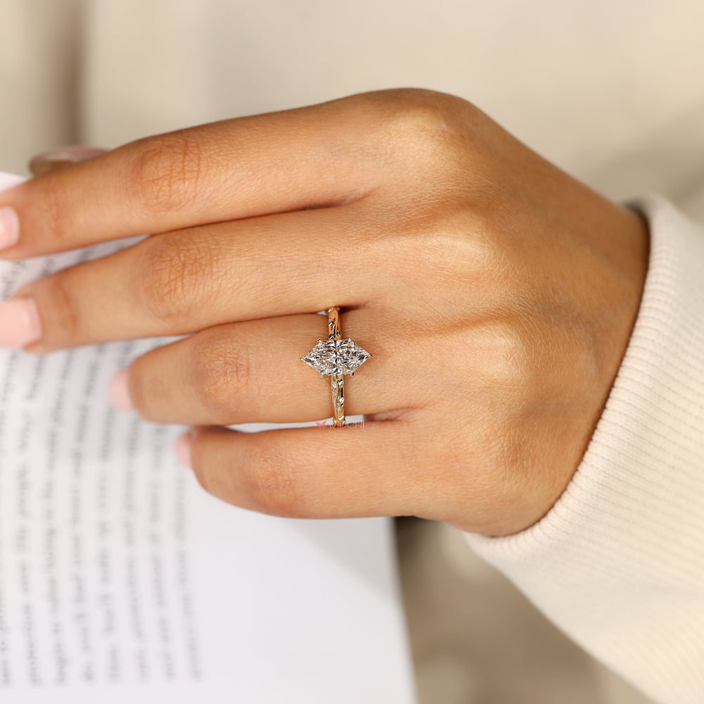 Dutch marquise ring with butterfly style detail.
