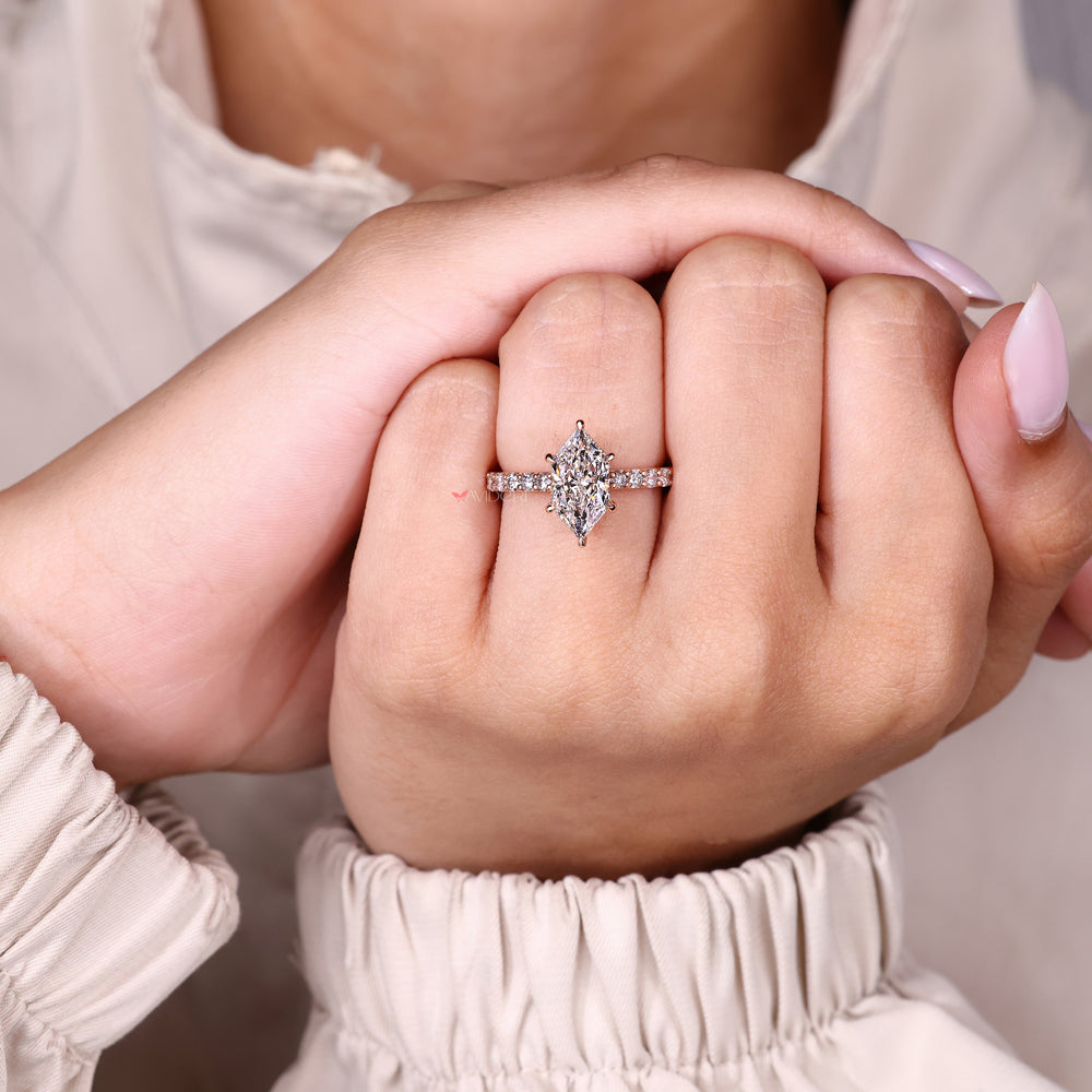 Cathedral setting Dutch marquise ring design.
