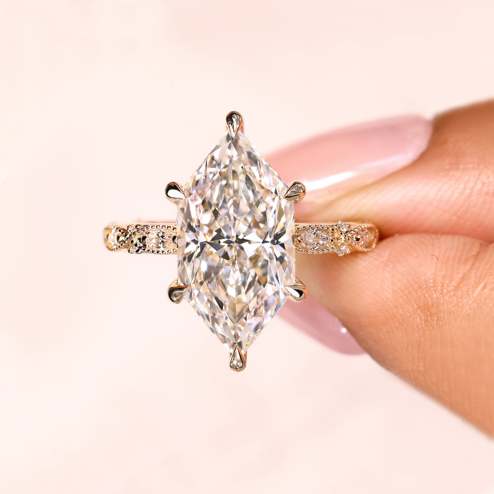 Milgrain setting marquise diamond ring design.
