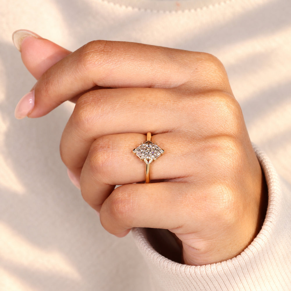 Handmade Dutch marquise diamond ring with leaf setting.
