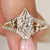 Dutch marquise diamond ring with split shank pave.

