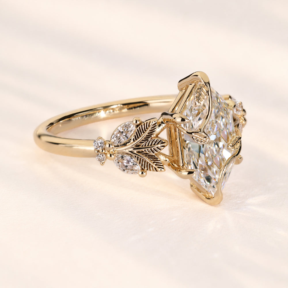 Dutch marquise ring with marquise and round diamonds.
