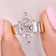 Dutch marquise solitaire diamond ring in yellow gold.