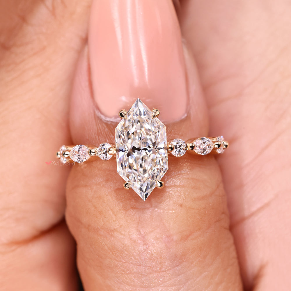 Dutch marquise diamond ring with shared prong pave band.
