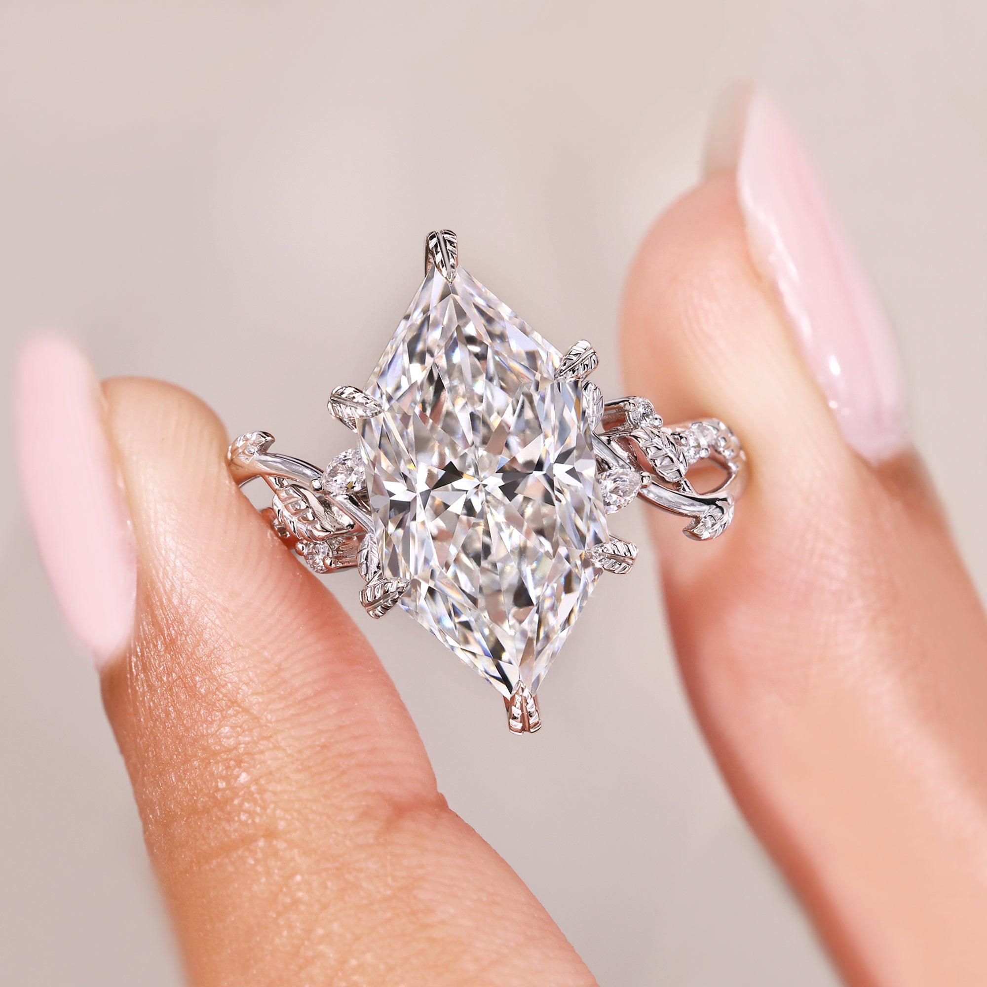 Marquise ring with leaf style prong setting.
