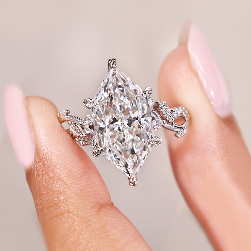 Marquise ring with leaf style prong setting.
