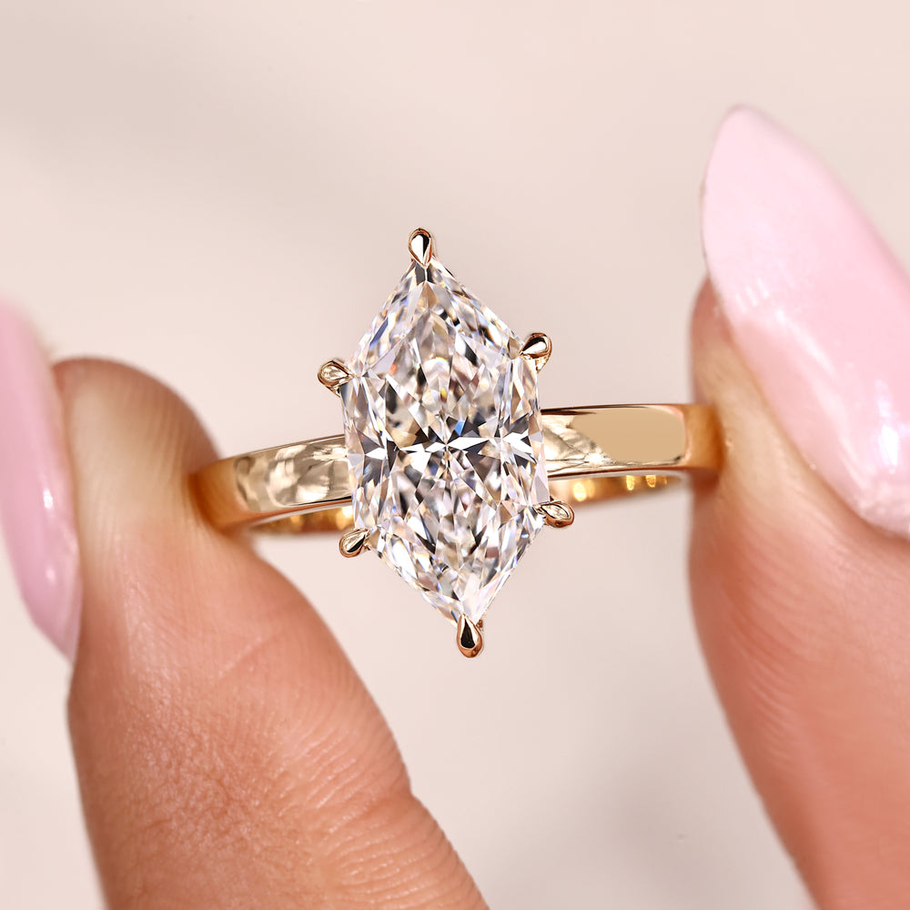 Six claw prong Dutch marquise diamond ring.