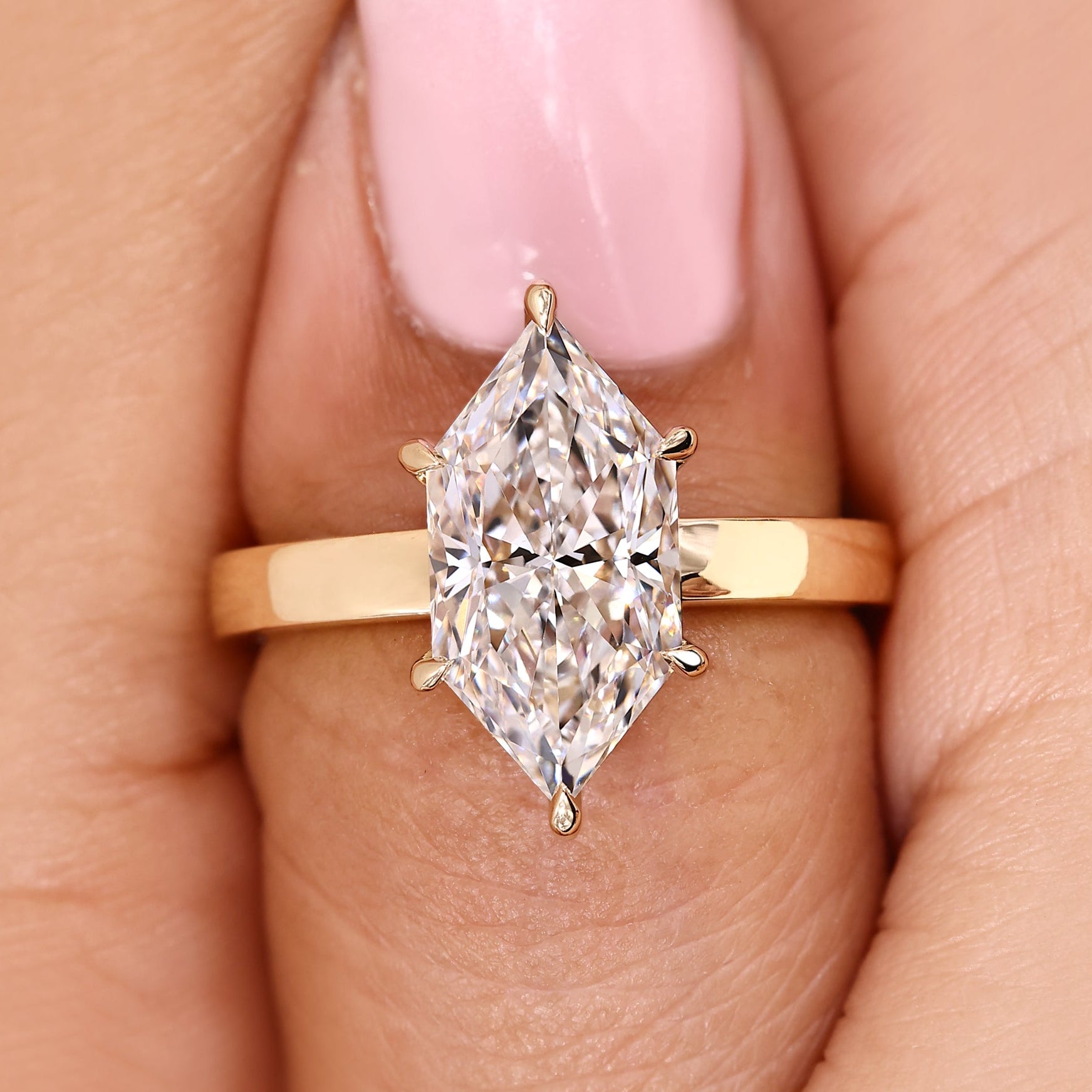 Dutch marquise ring with round diamond hidden halo.