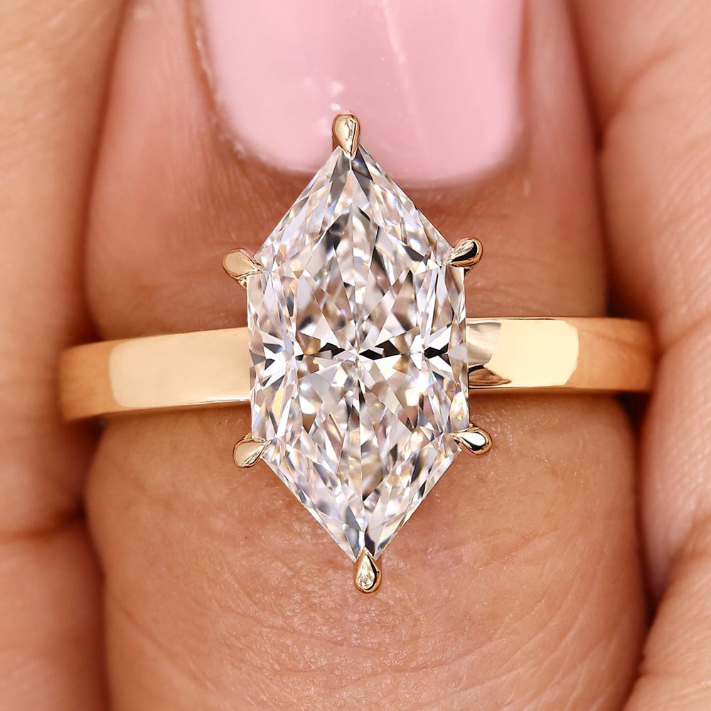Dutch marquise ring with round diamond hidden halo.