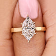 Dutch marquise ring with round diamond hidden halo.