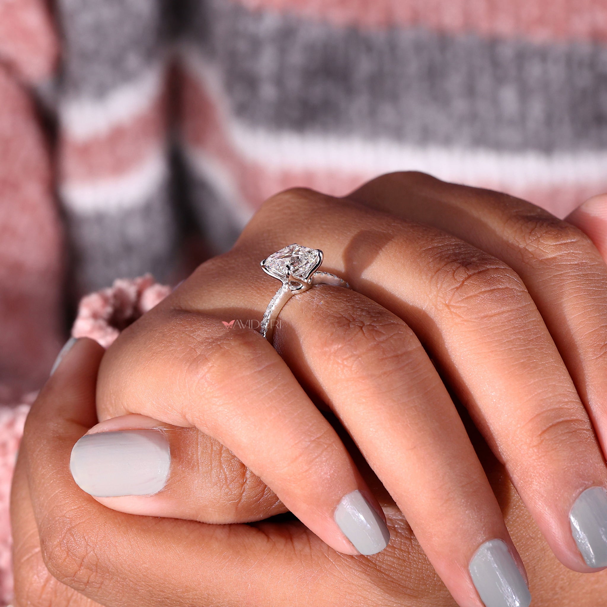 Diamond pave ring with prong set Asscher cut diamonds, combining brilliance and elegance in a handmade jewelry design.
