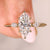 Marquise cut diamond ring three stone tulip.
