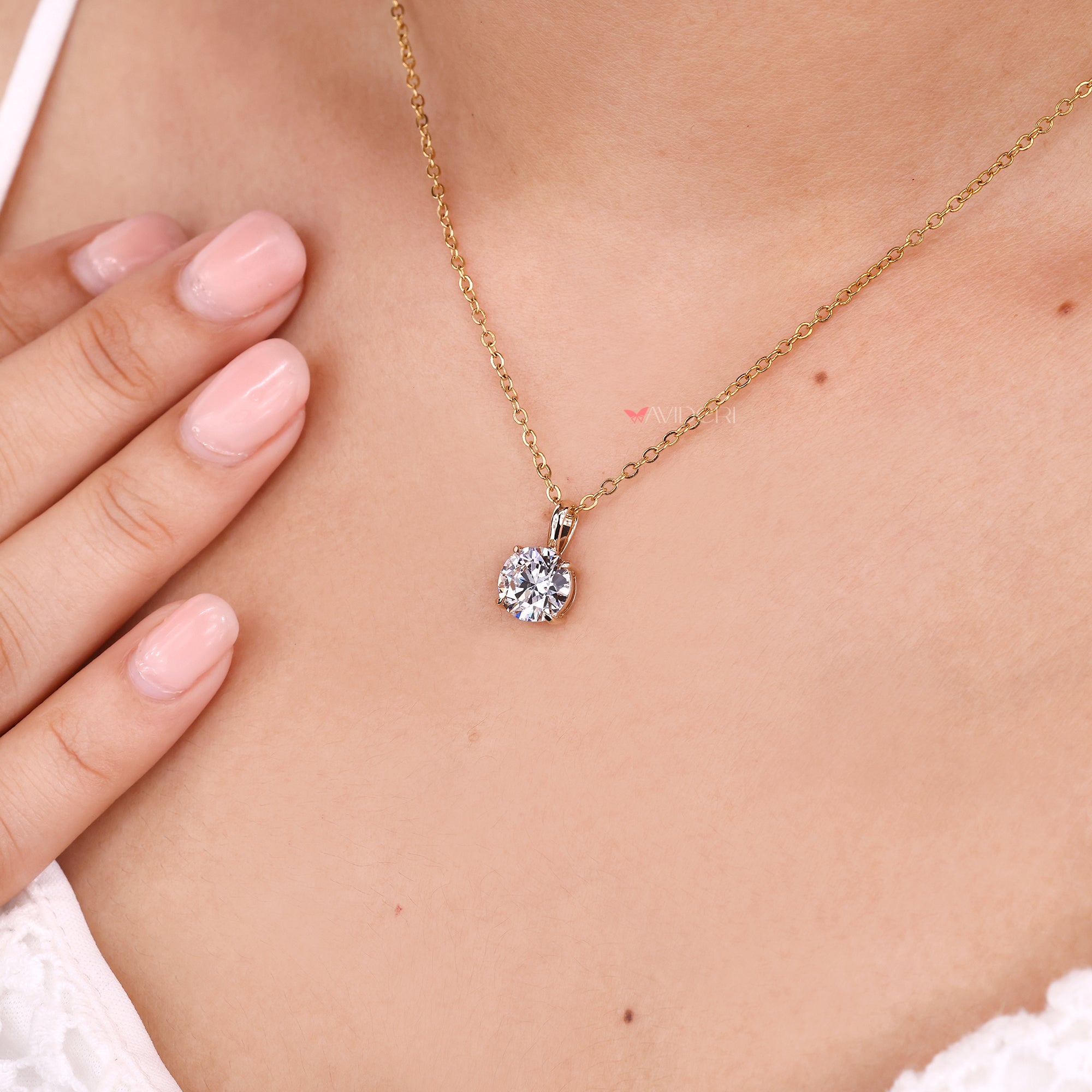 Fancy pendants designed with round cut diamond details.
