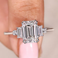 Emerald Cut Diamond Ring with Baguette And Round Side Stones