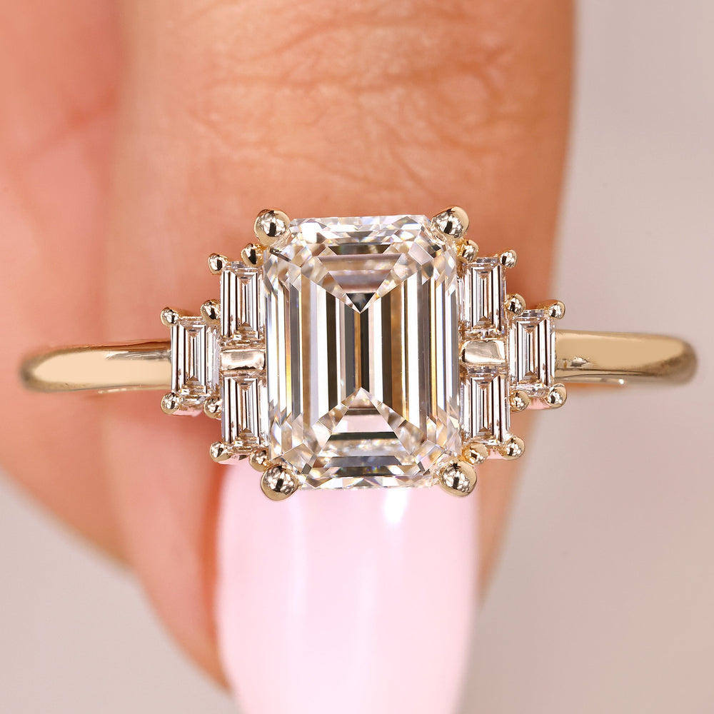 Emerald cut diamond ring with baguette side stones design
