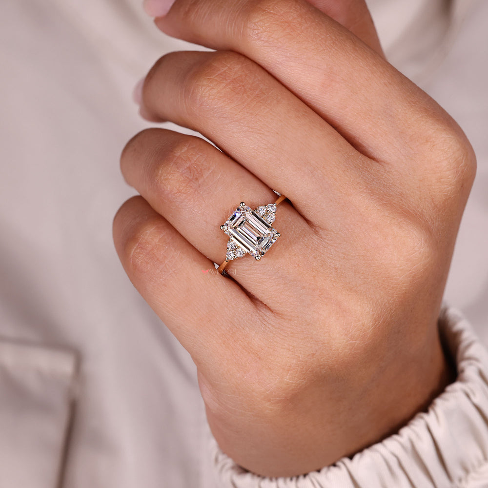 Elegant emerald cut diamond engagement ring.
