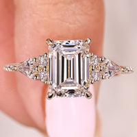 Emerald Cut Engagement Ring With Side Stone In Pave Style