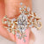 Marquise diamond ring with nature inspired band.

