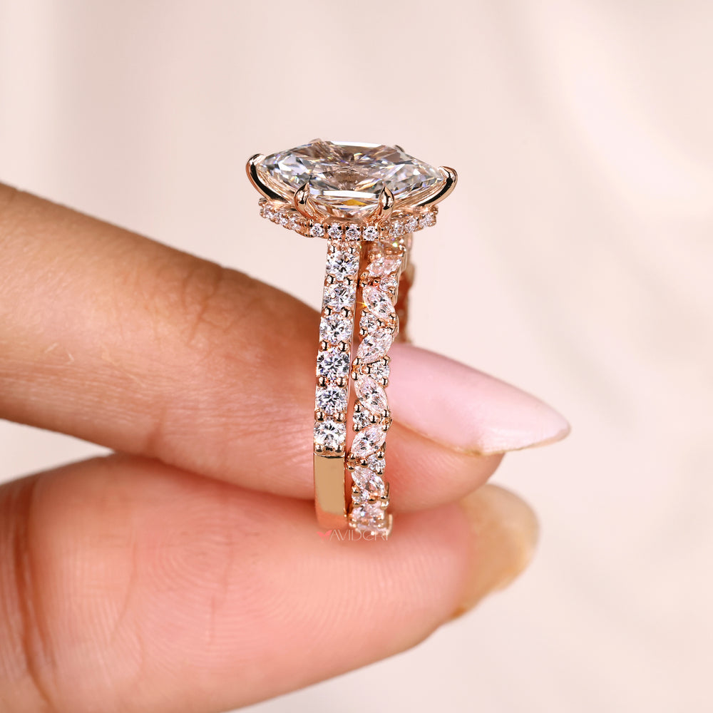 Engagement ring with marquise round eternity band.
