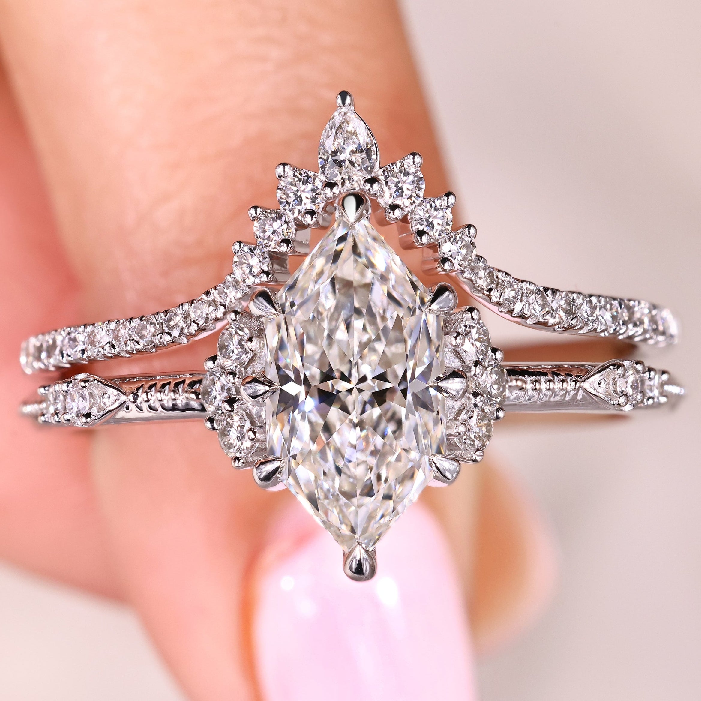 Dutch marquise diamond ring with matching semi eternity wedding band
