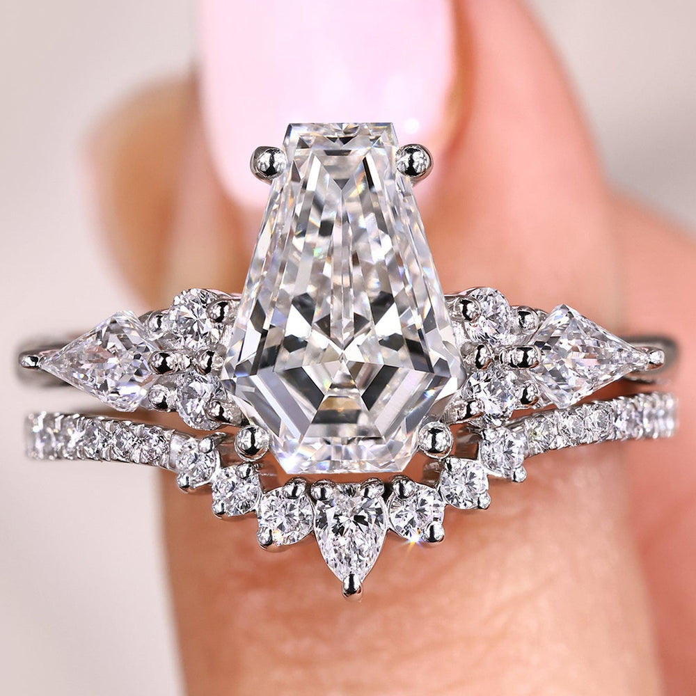 Coffin diamond engagement ring with matching curved wedding band

