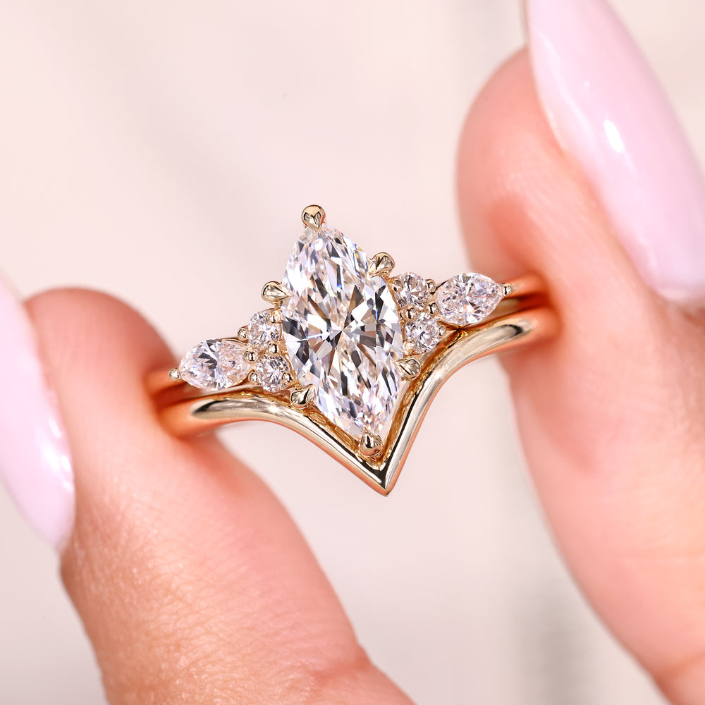 Simple wedding band with marquise diamond ring.
