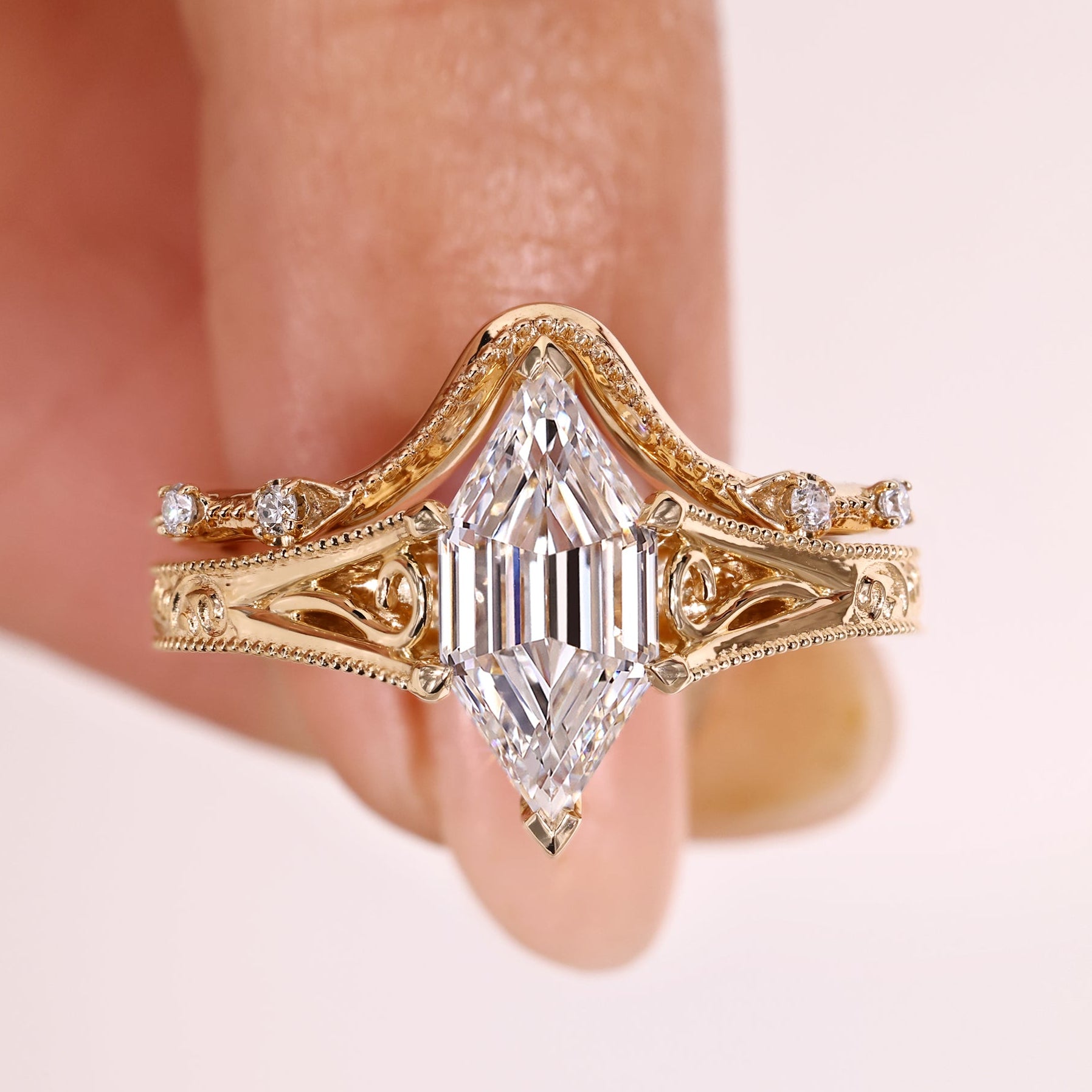 Vintage hexagon diamond bridal set with curved band.
