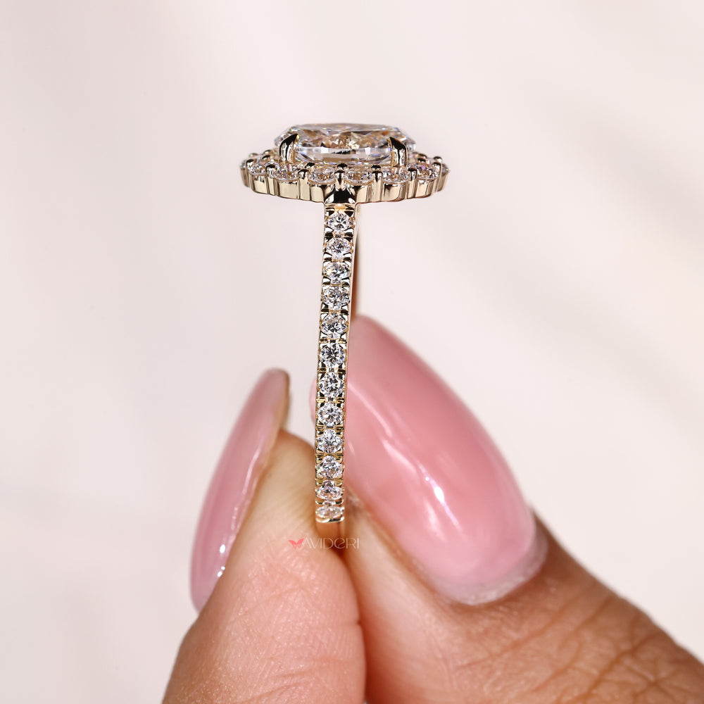 IGI certified oval diamond ring with four claw prongs
