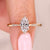 Marquise diamond ring with elegant tapered shank design.
