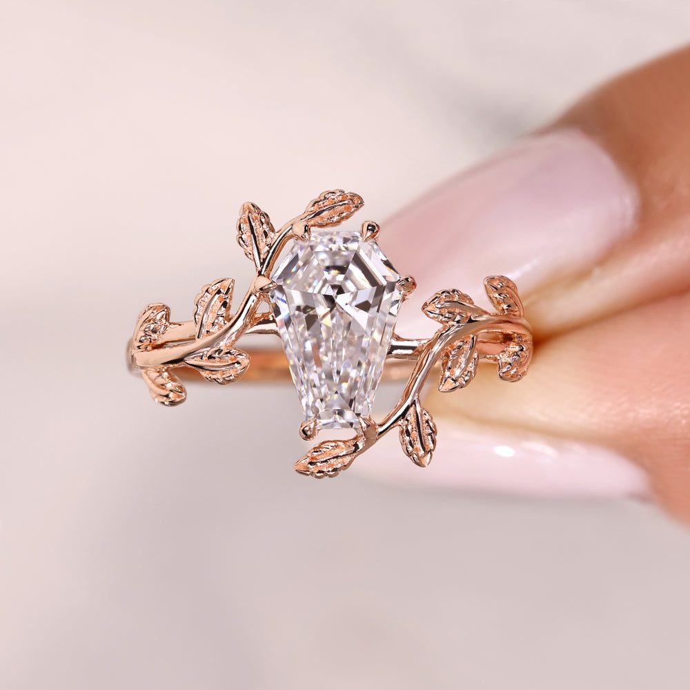 Minimal coffin cut diamond solitaire ring.
