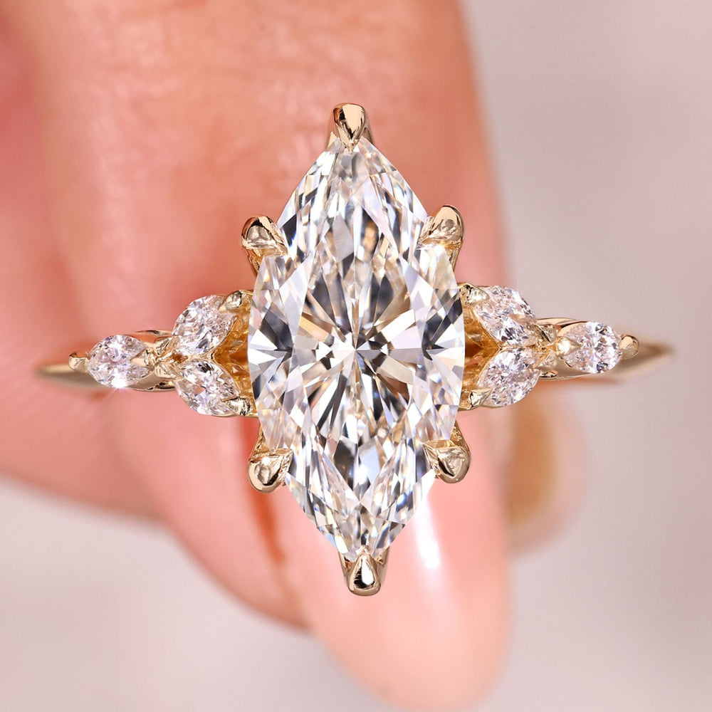 Marquise diamond ring with tulip setting.
