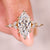 Marquise diamond ring with tulip setting.
