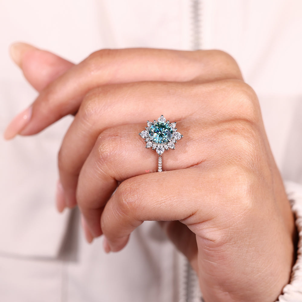 Handmade cyan blue moissanite ring by Avideri.
