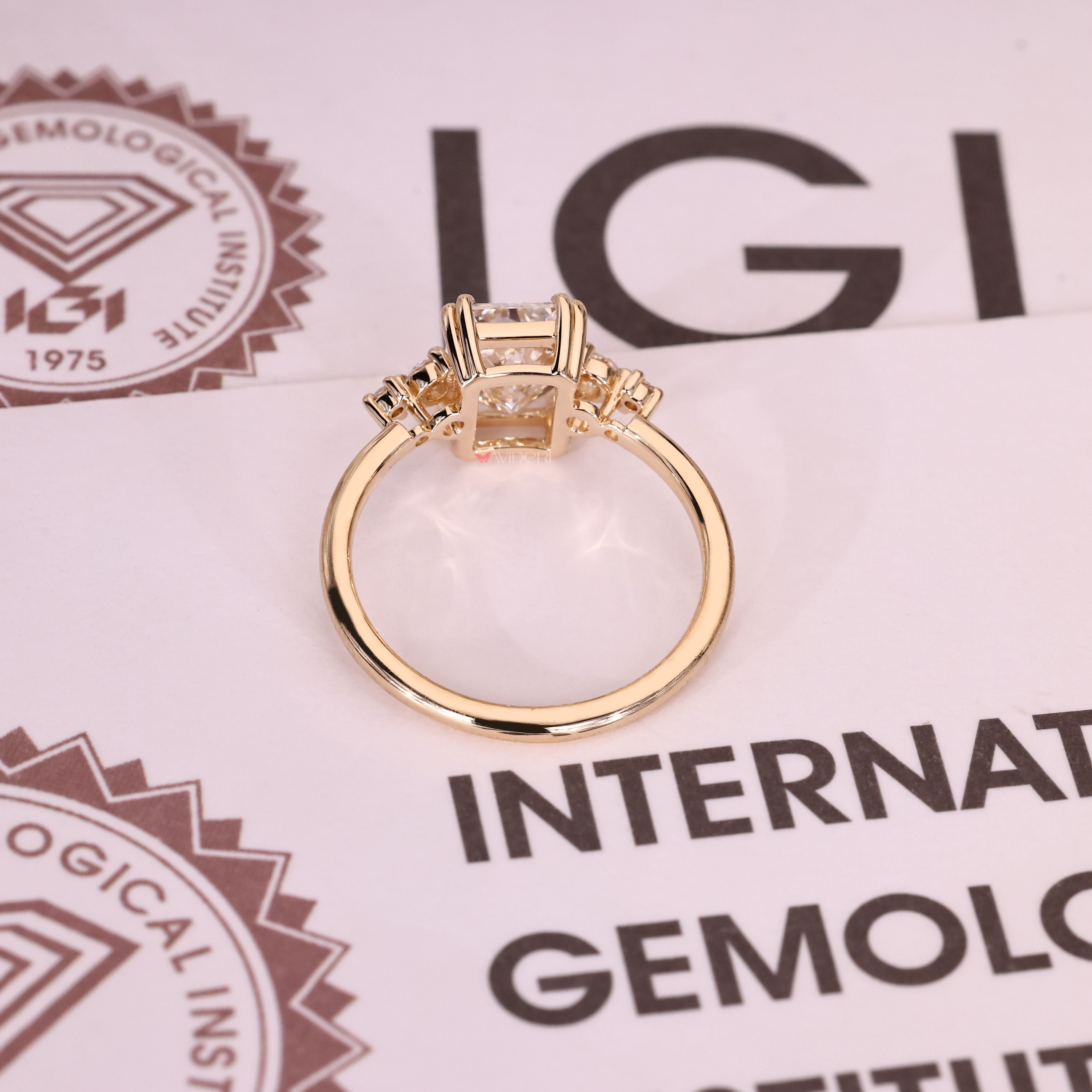 5 diamond ring featuring a radiant cut diamond for added sparkle.
