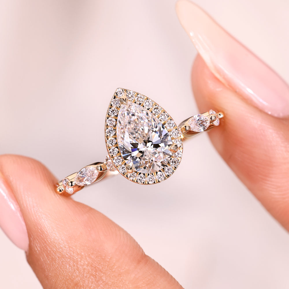 IGI certified pear diamond halo ring.

