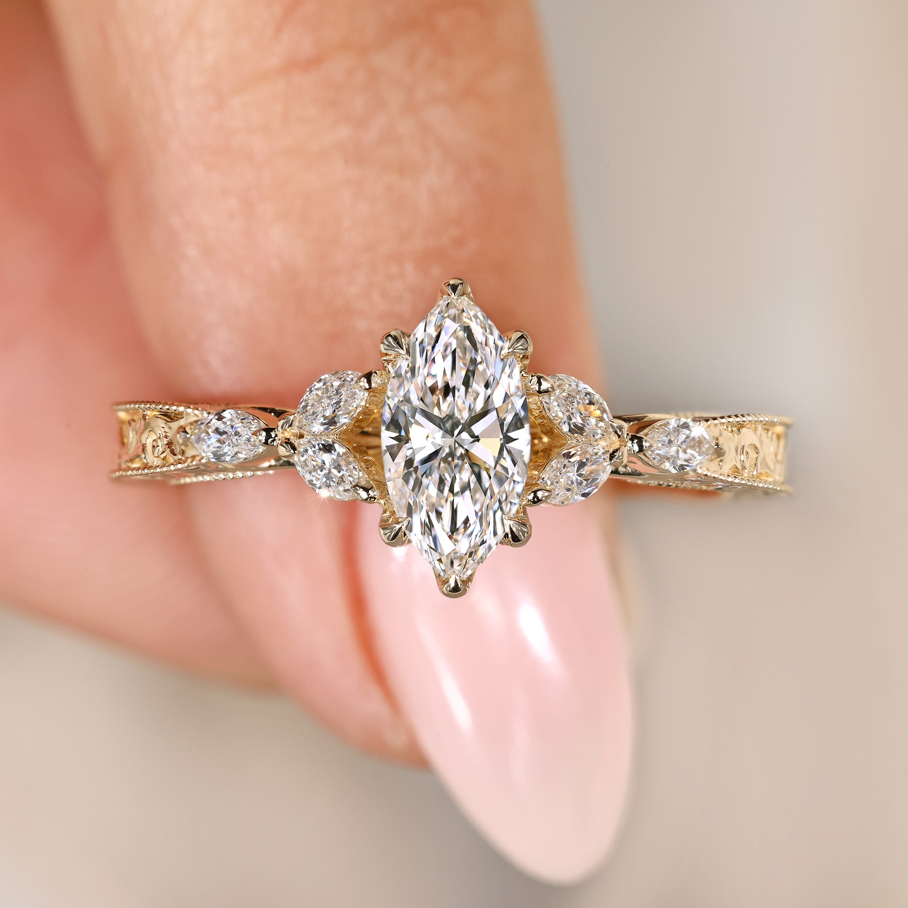 Marquise diamond ring with muse setting style.
