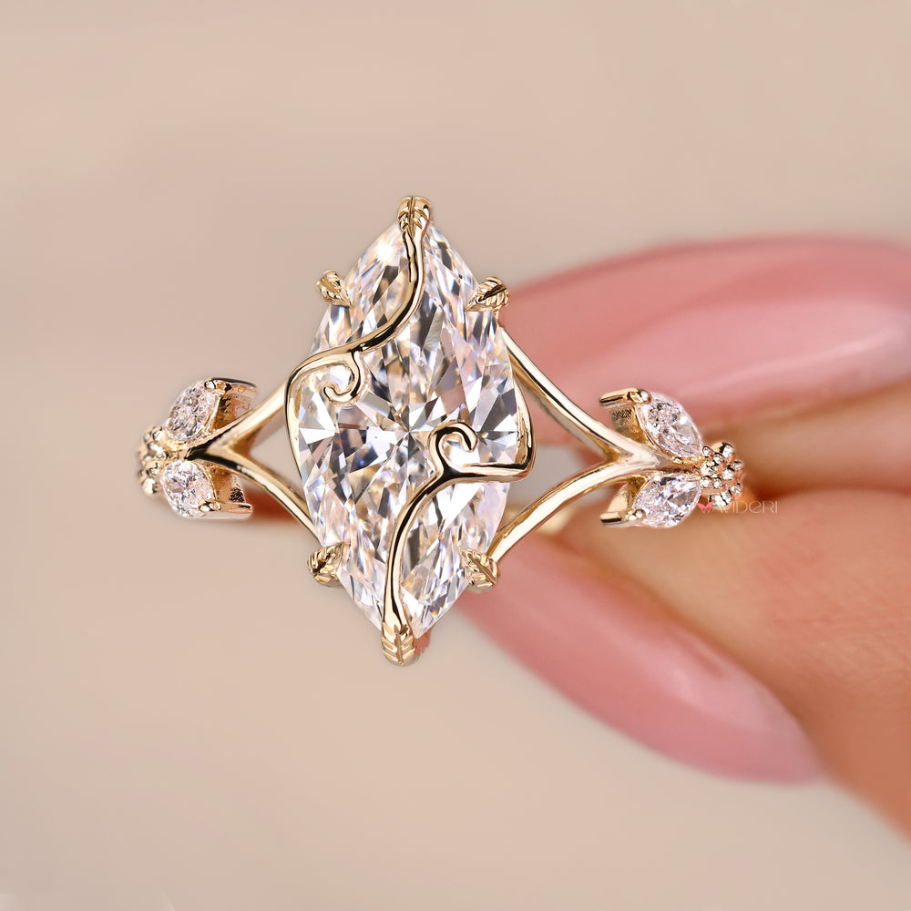Handmade marquise lab-grown diamond engagement ring featuring a unique nature-inspired design where flowing vines elegantly overlap and embrace the center diamond.
