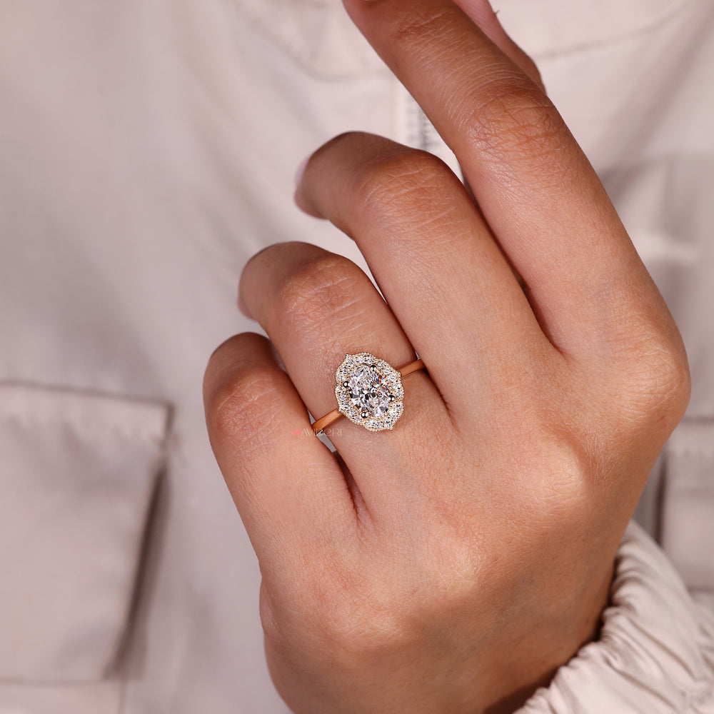 Handmade vintage style oval diamond engagement ring.