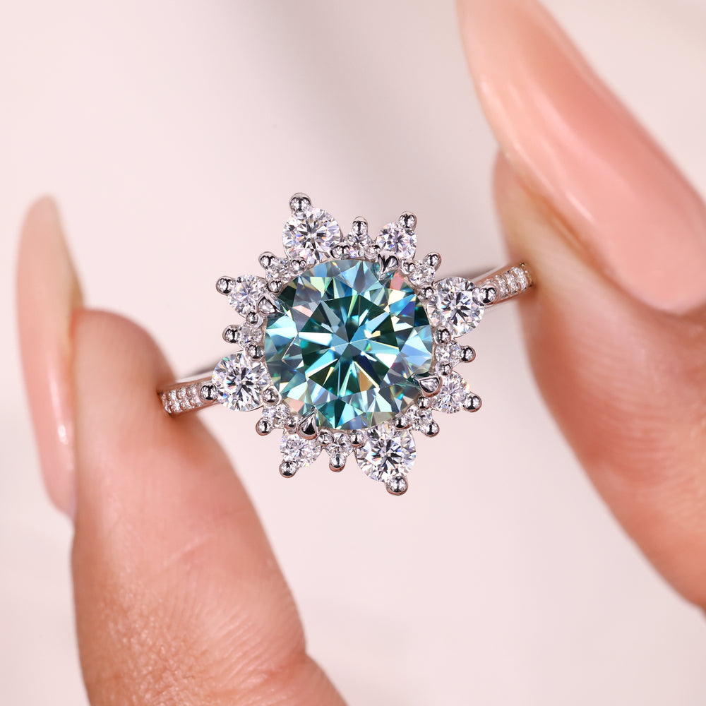 Round moissanite ring with prong setting.
