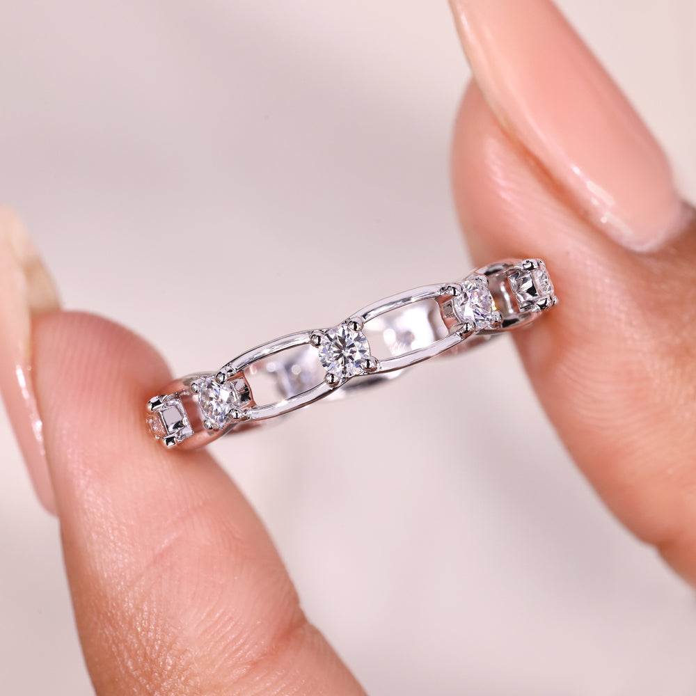 Round moissanite link style wedding band.
