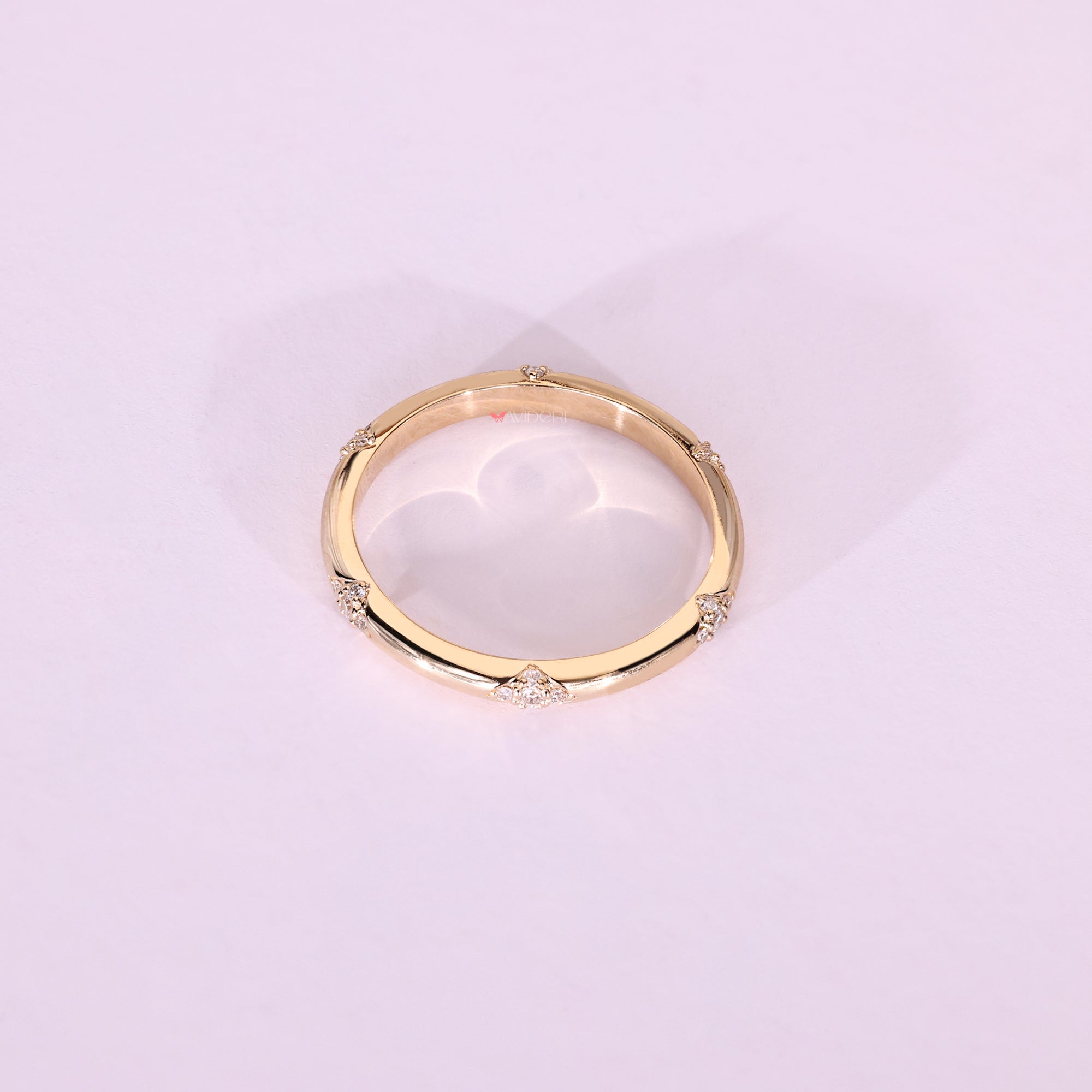 Round cut band with prong setting design.
