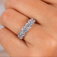 Six stone diamond ring with elegant design.
